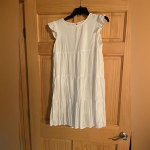 White dress. Small but fits like a large